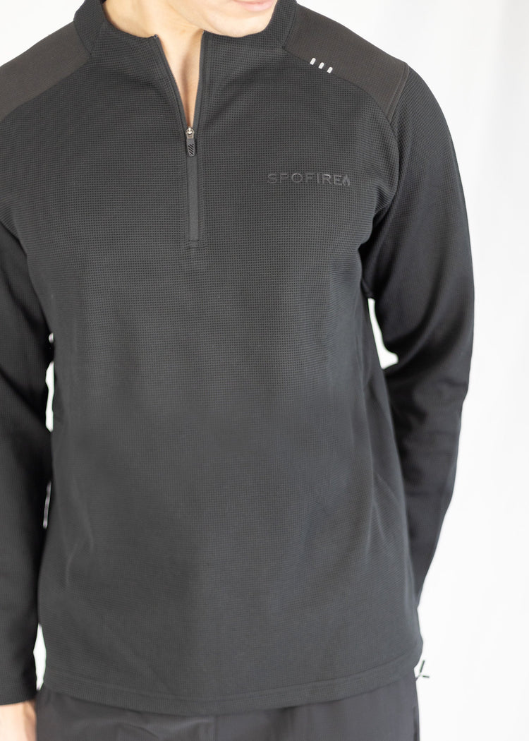 Black sweater with Spofire logo on a white background